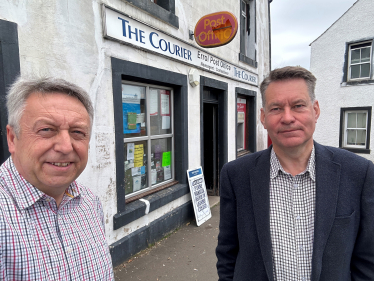Councillor Angus Forbes and Murdo outside Errol post office