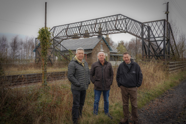 Murdo pictured with Councillor Forbes and Mac Roberts at Errol Station 